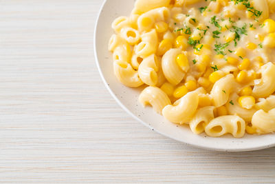 High angle view of pasta in plate on table