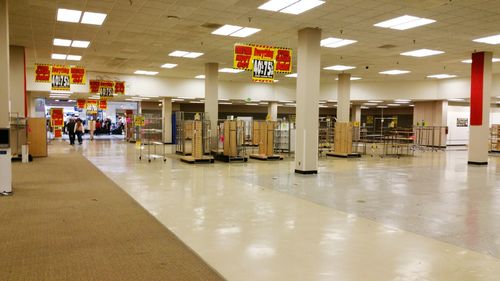 People in illuminated building
