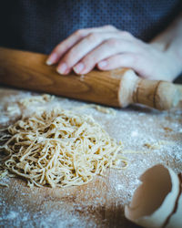 Midsection of person preparing food