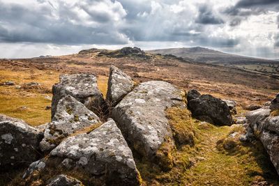 Rocks on land against sky