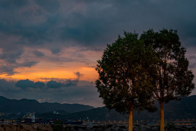 Scenic view of mountains against sky at sunset