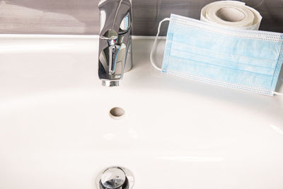 High angle view of faucet in bathroom