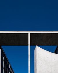 Low angle view of building against blue sky