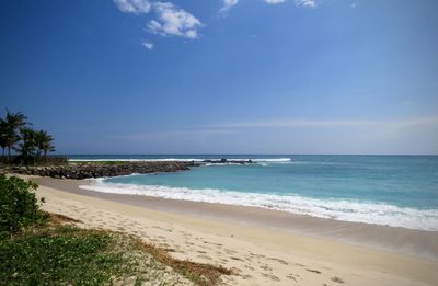 Scenic view of beach against sky