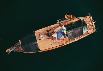 Boat sailing on sea against sky