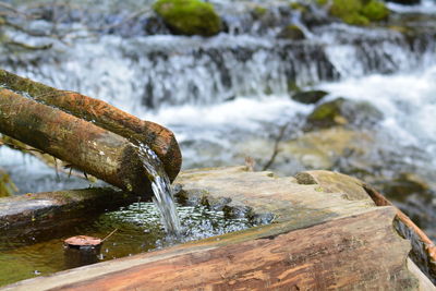 Close-up of water flowing through rocks