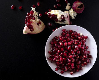 High angle view of strawberries in bowl on table
