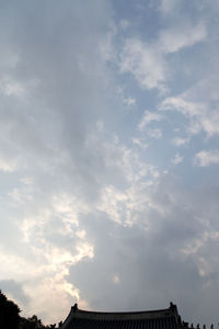 Low angle view of roof against sky