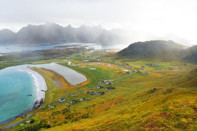 Panoramic view from mountain top over beach and countryside at the coast in lofoten norway