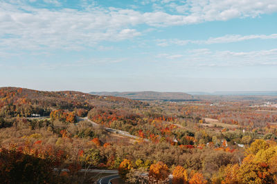 Scenic view of landscape against sky during autumn