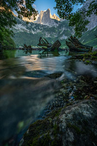 Scenic view of water flowing through rocks