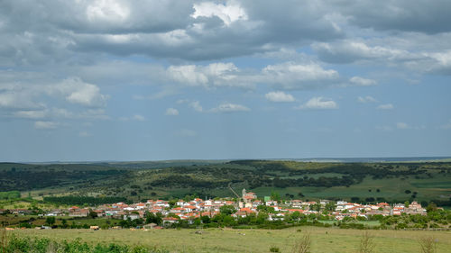 Scenic view of townscape against sky