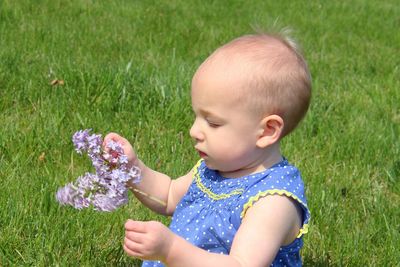 Cute baby girl in grass