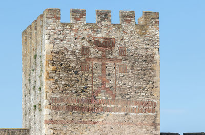 Low angle view of old building against sky