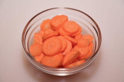 High angle view of chopped fruits in bowl on table