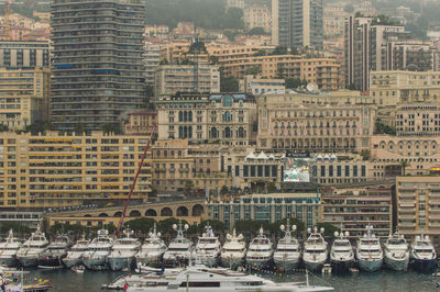 View of boats moored in city