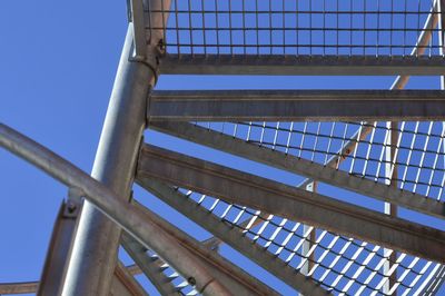 Low angle view of staircase against sky