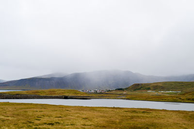 View on a small icelandic village near kirkjuffell