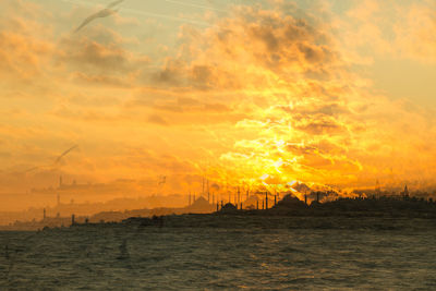 Scenic view of sea against sky during sunset