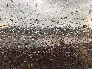 Full frame shot of wet glass window