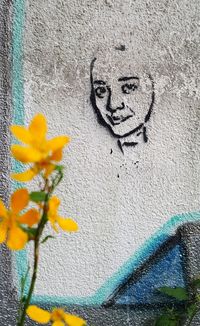 Close-up of text on wall