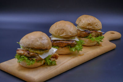 Close-up of burger on cutting board