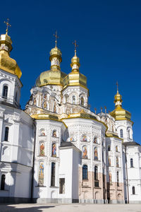 Low angle view of building against blue sky