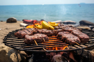 Close-up of meat on barbecue grill