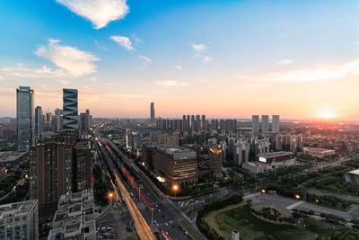 High angle view of buildings in city against sky