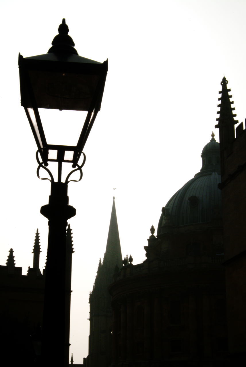 architecture, built structure, building exterior, sky, street light, low angle view, travel destinations, silhouette, nature, city, lighting, building, lighting equipment, history, no people, street, the past, clear sky, travel, outdoors, tower, religion, evening, tourism, light