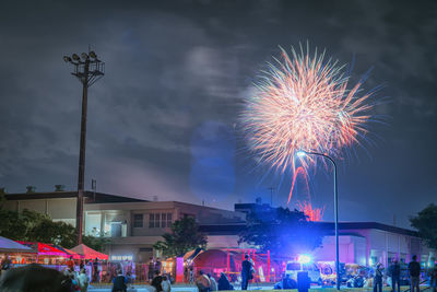 People on street at night