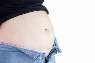 Close-up of woman against white background