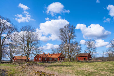 House on field against sky