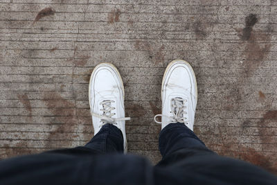 Low section of person standing on floor