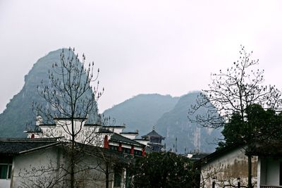 Built structure with mountain range in background