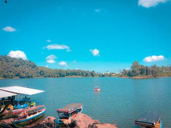 Panoramic view of sea against blue sky