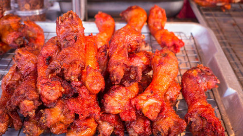 High angle view of meat on barbecue grill