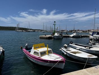 Boats moored at harbor