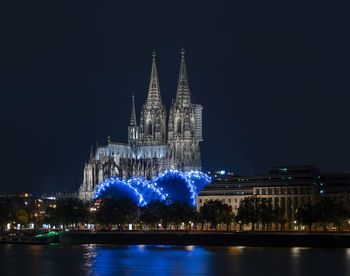 Illuminated buildings at waterfront