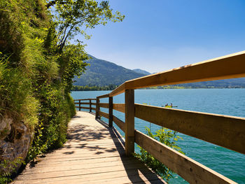 Scenic view of lake against blue sky