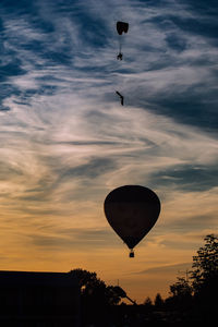 Low angle view of hot air balloon against sky during sunset