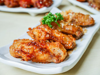 High angle view of meat in plate on table
