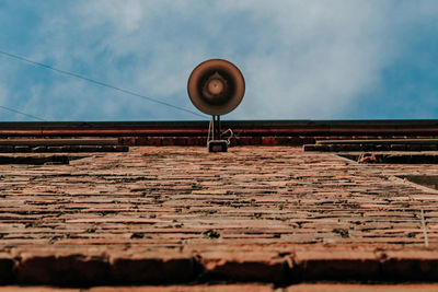 Low angle view of roof against sky