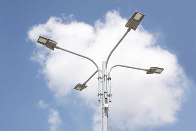 Low angle view of street light against sky