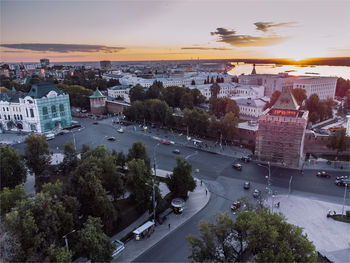 High angle view of city street and buildings against sky