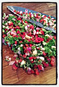 Close-up of red chili pepper on wooden table