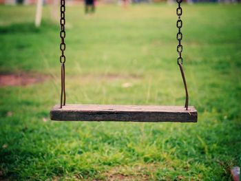 Close-up of swing on playground