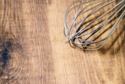Close-up of metallic object on table