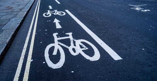 High angle view of bicycle sign on road