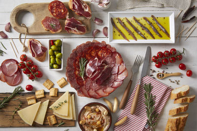 Spanish tapas. a table with typical spanish food seen from above.  